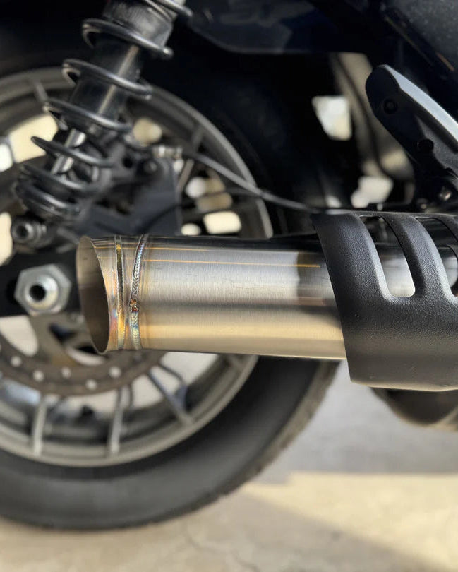 Slip-on muffler exhaust system for a Harley Davidson Nightster, made of stainless steel, installed on a motorcycle, photo 4 of 5