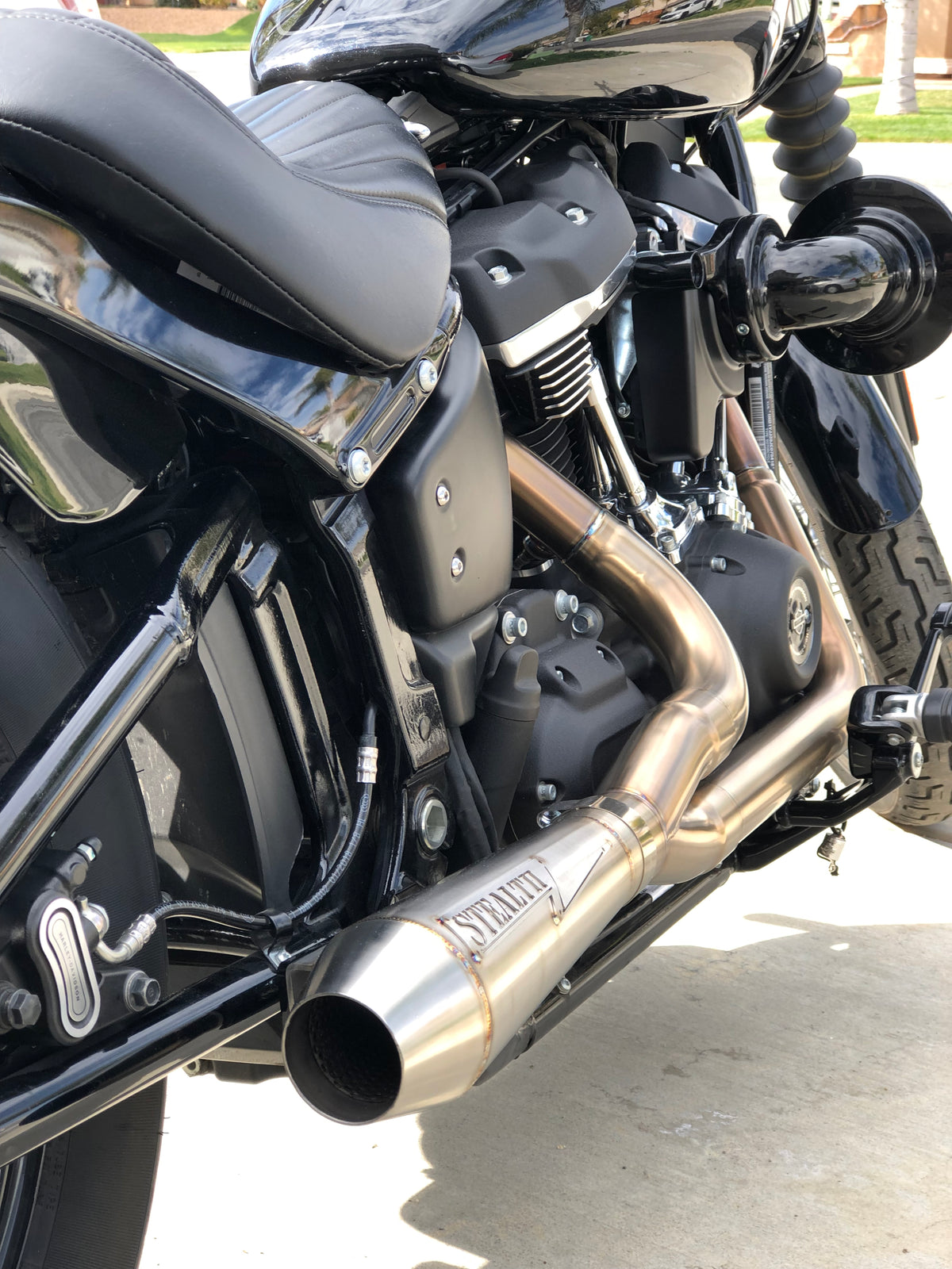 Harley M8 Softail motorcycle with Stealth Pipes exhaust – riding photo, stainless muffler upgrade for 2017–2025 models, photo 7 of 36